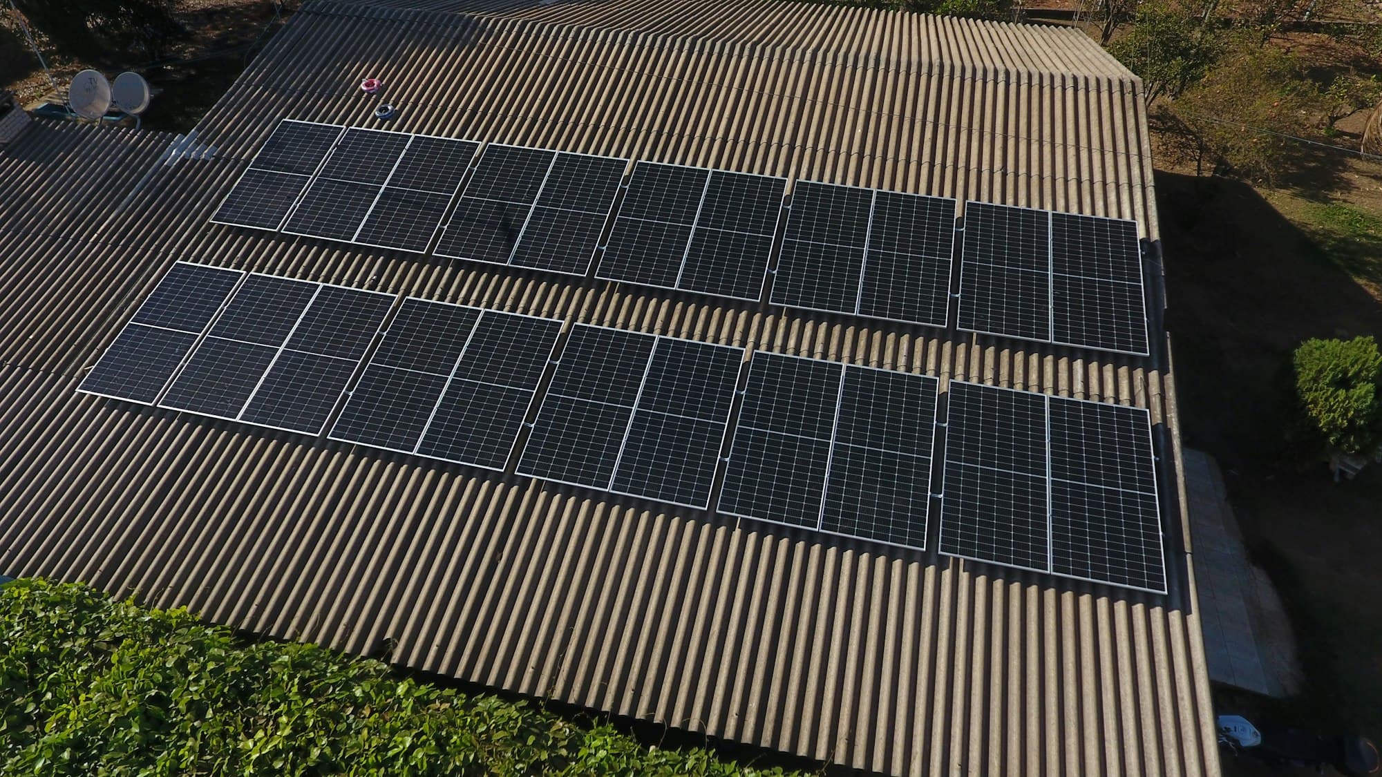 Solar panels mounted on a corrugated metal roof